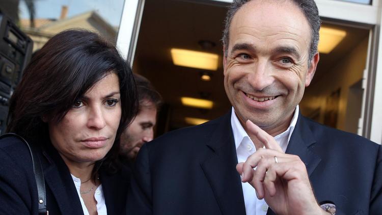 Jean-François Copé, avec sa femme Nadia Copé, après un meeting de militants UMP, le 6 octobre 2012 à Hyeres (Var) [Jean-Christophe Magnenet / AFP]