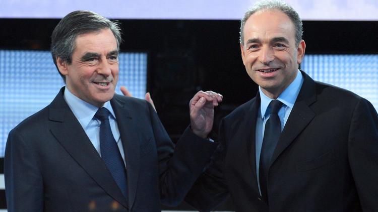 Les deux candidats à la présidence de l'UMP, François Fillon (g) et Jean-François Copé (d) [Miguel Medina / AFP]