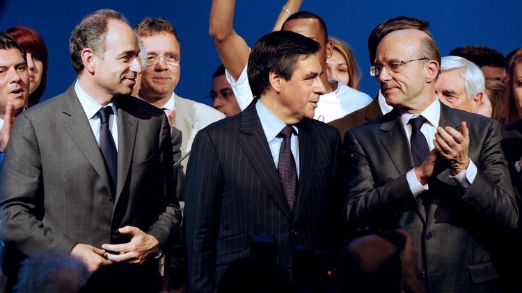 Jean-François Copé (g), François Fillon (c) et Alain Juppé lors de la campagne présidentielle, le 3 mai 2012 à Bordeaux [Jean-Pierre Muller / AFP/Archives]
