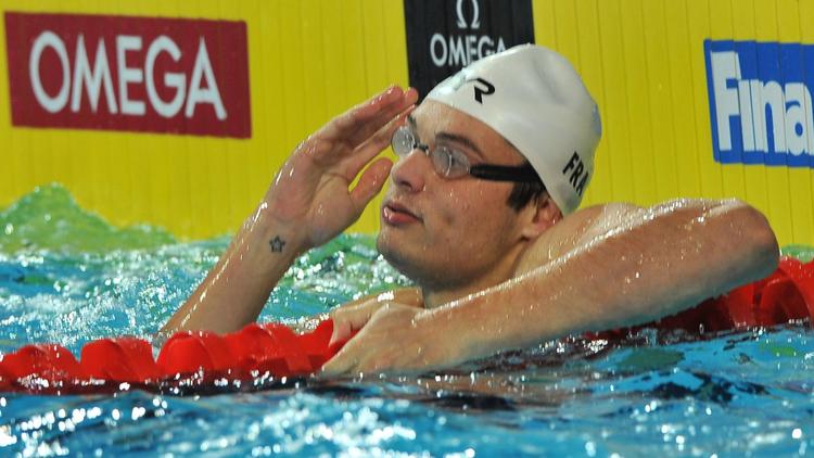 Florent Manaudou a décroché sa première médaille, le bronze, sur 50 m brasse, lors de la dernière journée des Mondiaux-2012 en petit bassin, le 16 décembre à Istanbul. [Bulent Kilic / AFP]
