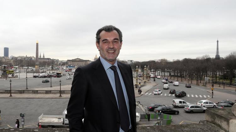 Le président du réseau d'agences immobilières Century 21, Laurent Vimont, pose place de la Concorde à Paris, le 7 janvier 2012 [Jacques Demarthon / AFP]