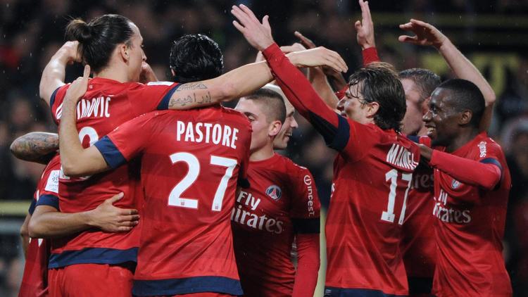 Les joueurs parisiens se congratulent après l'un de leurs quatre buts contre Toulouse, le 1er février 2013 au Stadium. [Pascal Pavani / AFP]