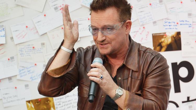 Bono lors d'un débat sur la pauvreté au siège de la Banque mondiale, à Washington, le 14 novembre 2012 [Mandel Ngan / AFP]