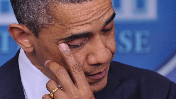 Le président Barack Obama extrêmement ému après la fusillade dans le Connecticut, le 14 décembre 2012 à Washington [Mandel Ngan / AFP]