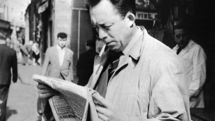 Albert Camus dans une rue de Paris en 1959 [ / AFP/Archives]