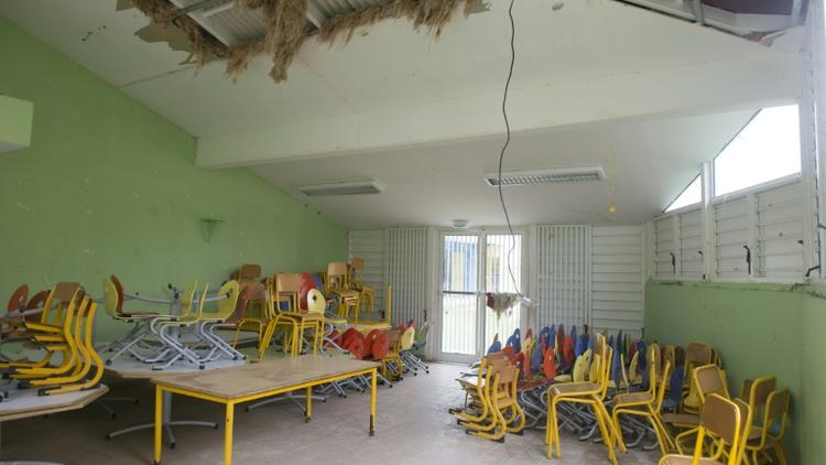 Dégâts causés en septembre 2017 par le passage de l'ouragan Irma dans une école à Marigot, sur l'île de Saint-Martin [Helene Valenzuela / AFP/Archives]