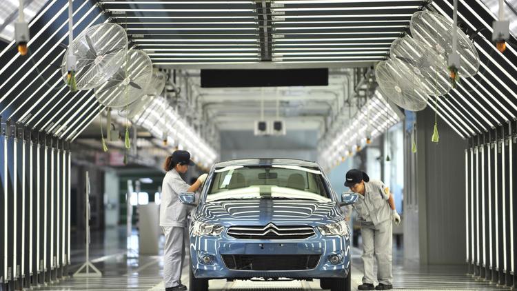 L'usine PSA Peugeot Citroën-Dongfeng, à Wuhan, dans le centre de la Chine, le 2 juillet 2013 [ / AFP/Archives]