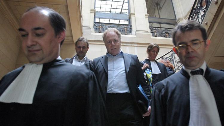 Alain Rosenberg (c), dirigeant de l'Eglise française de scientologie, au Palais de justice de Paris le 26 mai 2009 [Pierre Verdy / AFP/Archives]