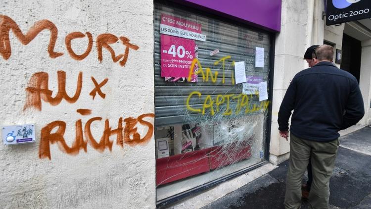 Après une manifestation à Montpellier contre la politique du président Emmanuel Macron, le 14 avril 2018 [Pascal GUYOT / AFP]