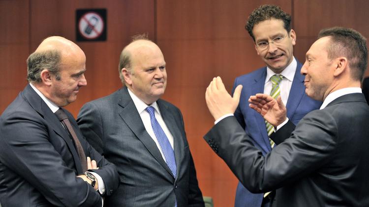 Les ministres des finances (de g à d) espagnol Luis De Guinos Jurado, irlandais Michael Noonan, néerlandais Jeroen Dijsselbloem et grec Yannis Stournaras, lors d'une réunion de l'Eurogroupe le 10 mars 2014 à Bruxelles [Georges Gobet / AFP/Archives]