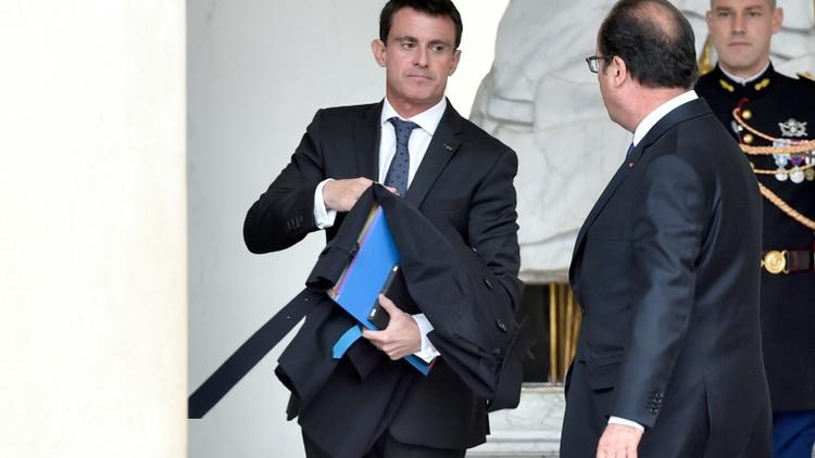 Manuel Valls et François Hollande à la sortie du conseil des ministres le 19 octobre 2016 à l'Elysée à Paris [ALAIN JOCARD / AFP/Archives]