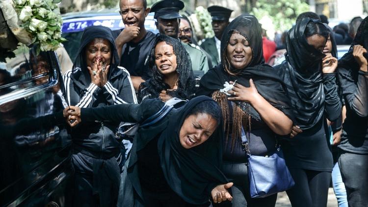 Des proches des victimes du crash le 17 mars 2019 à Addis Abeba [Samuel HABTAB / AFP]