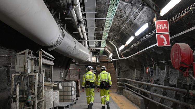 Dans la Meuse, à 500 m sous terre, les ouvriers du futur centre d’enfouissement de déchets nucléaires doivent prévoir ce que deviendront les rebuts les plus radioactifs d’ici à... 400.000 ans. [FREDERICK FLORIN / AFP]