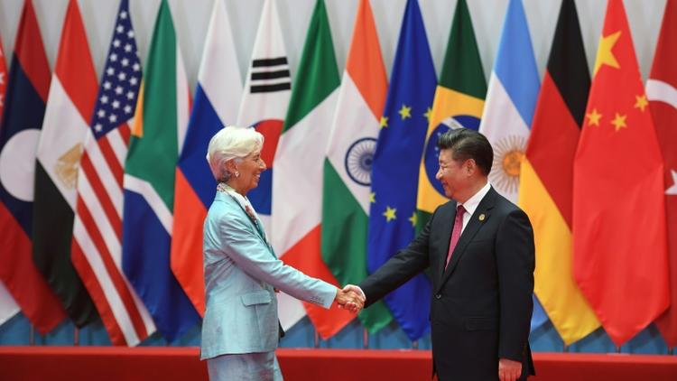 La directrice générale du Fonds Monétaire International (FMI) Christine Lagarde et le président chinois Xi Jinping, hôte du sommet du G20 organisé, à Hangzhou (est de la Chine), le 4 septembre 2016 [Greg BAKER / AFP]