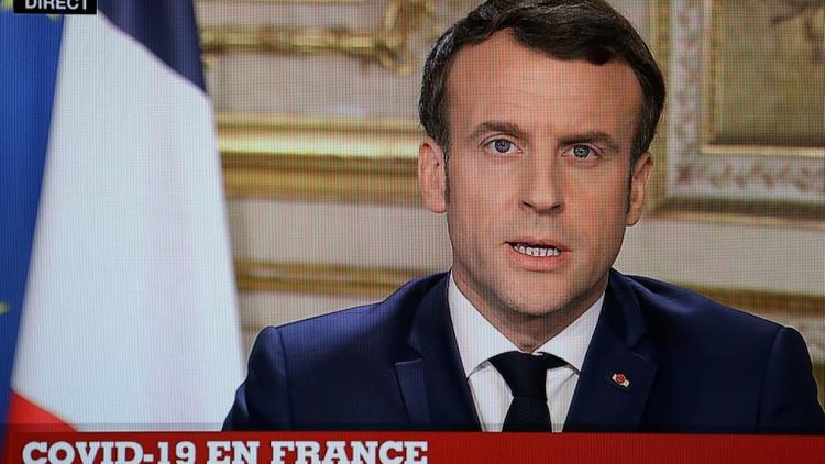 Emmanuel Macron s'exprime depuis l'Elysée sur le coronavirus, le 12 mars 2020 [Ludovic Marin / AFP]