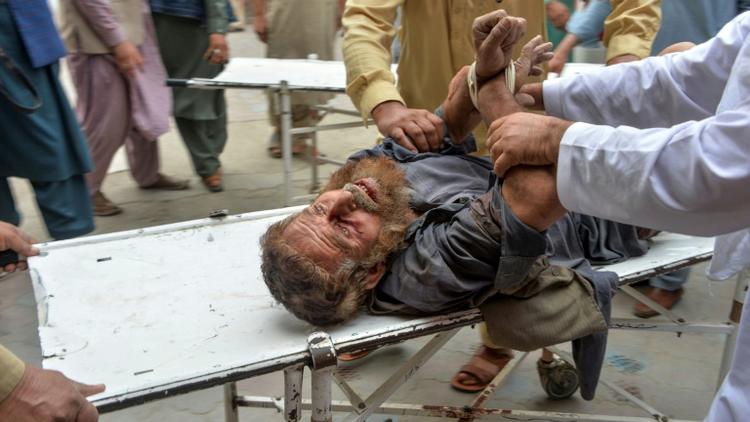 Une victime d'un attentat contre une mosquée de l'est de l'Afghanistan, qui a fait des dizaines de morts le 18 octobre 2019 [NOORULLAH SHIRZADA / AFP]
