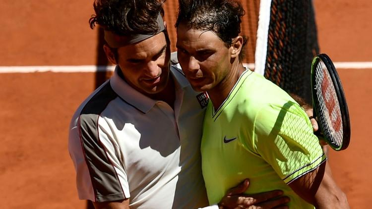 L'Espagnol Rafael Nadal (d) domine le Suisse Roger Federer en demi-finale de Roland-Garros le 7 juin 2019 [Philippe LOPEZ / AFP]