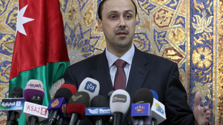 Le ministre jordanien de l'Information, Mohammad Momani, à Amman le 15 mai 2013 [ / AFP/Archives]