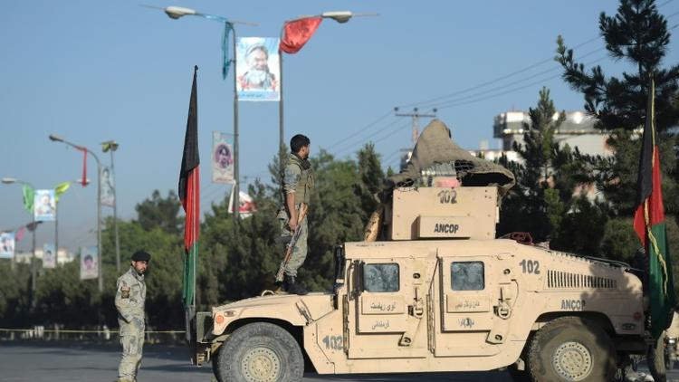 Des forces de sécurité afghanes à Kaboul après un attentat suicide contre des chiites, le 16 juin 2017 [WAKIL KOHSAR / AFP/Archives]