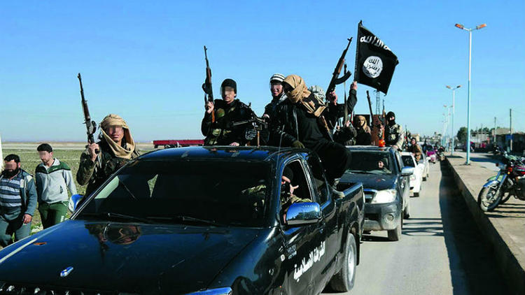 Le groupe islamiste règne sur un territoire à cheval entre l'Irak et la Syrie. 