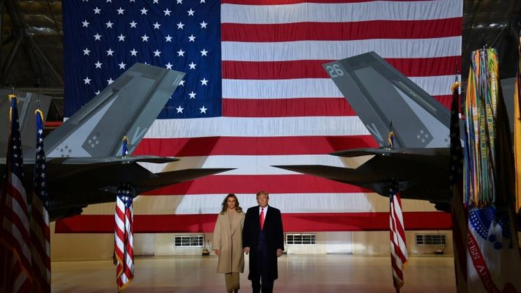 Le président américain Donald Trump accompagné de sa femme Melania Trump le 20 décembre 2019 à la Joint Base Andrews, dans le Maryland [Nicholas Kamm / AFP]