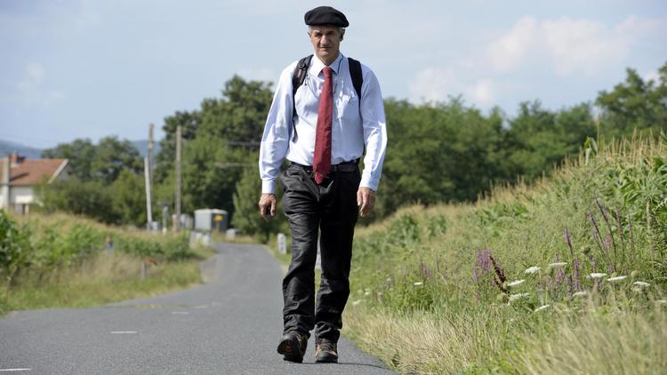 Le député Jean Lassalle sur la route près de Corcelles-en-Beaujolais, le 9 août 2013 [Philippe Desmazes / AFP/Archives]