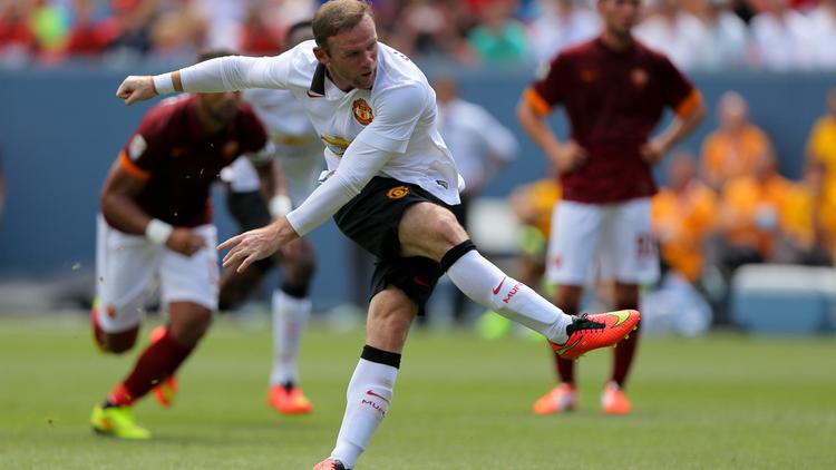 Wayne Rooney marque son 2e but personnel sur penalty lors du match Manchester United-AS Rome dans l'International Champions Cup, le 26 juillet 2014 à Denver  [Justin Edmonds / AFP]