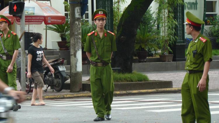 Des policiers à Hanoï [Ian Timberlake / AFP/Archives]