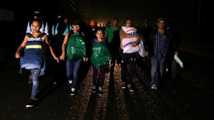 Des migrants honduriens en route pour les Etats-Unis, le 14 janvier 2019 à San Pedro Sula [ORLANDO SIERRA / AFP]