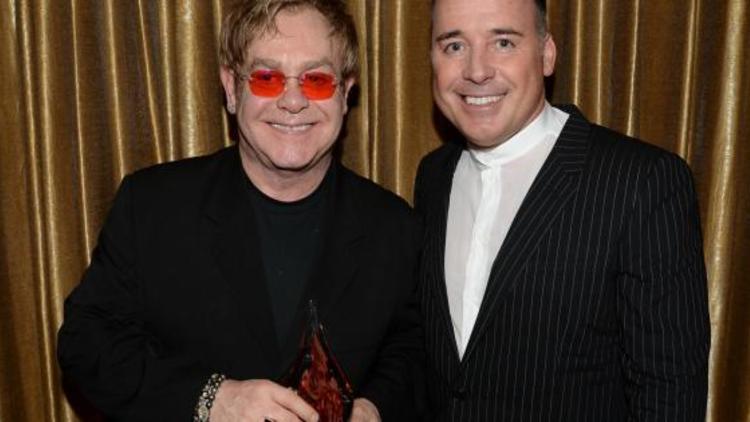 Elton John (à gauche) et son compagnon David Furnish le 13 avril 2013 à Beverly Hills