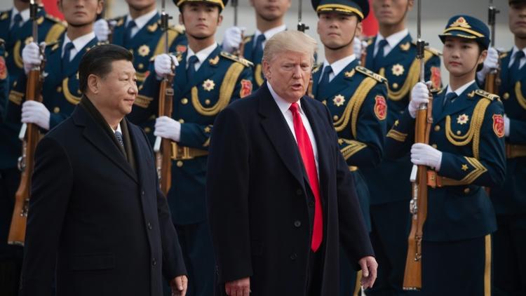 Donald Trump et Xi Jinping le 7 novembre 2017 à Pékin [NICOLAS ASFOURI / AFP/Archives]
