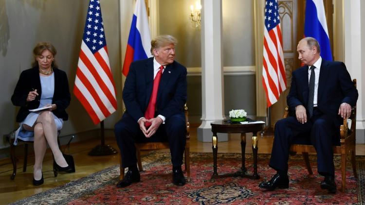 Le président américain Donald Trump rencontre le président russe Vladimir Poutine, le 16 juillet 2018 à Helsinki [Brendan Smialowski / AFP/Archives]