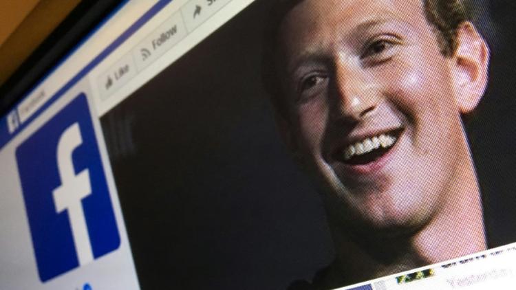 Photo d'illustration prise le 22 mars 2018 à Moscou montrant le patron de Facebook Mark Zuckerberg sur une page du réseau social. [Mladen ANTONOV / AFP]