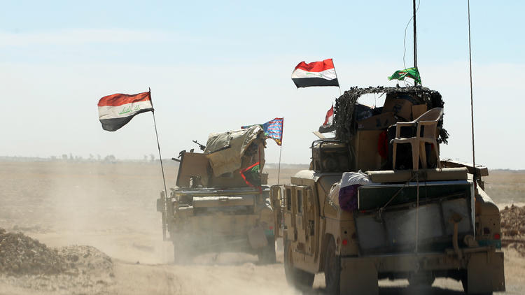 Des troupes irakiennes sur la base militaire de Qayyarah, à soixante km au Sud de Mossoul. 