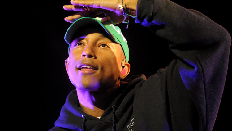 A 43 ans, Pharrell Williams est devenu un pilier de la scène musicale américaine. [Fred Tanneau / AFP]