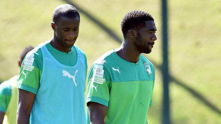Yaya et Kolo Touré s'entraînent à Lindoia au Brésil le 17 juin 2014.