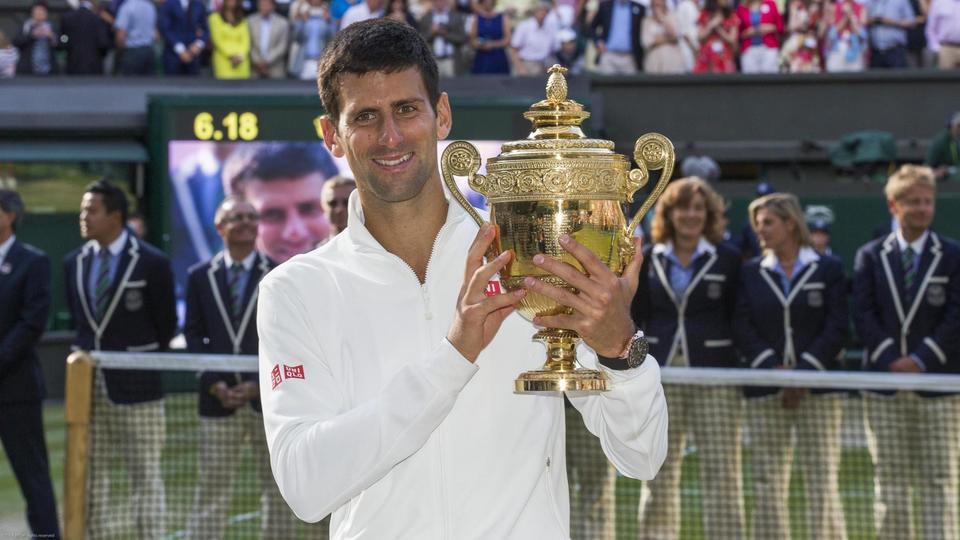 En 2014, Novak Djokovic dompte Roger Federer dans son jardin de Wimbledon pour y décrocher son deuxième titre à Londres.